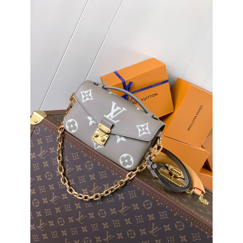 M23081Pochette Métis East West